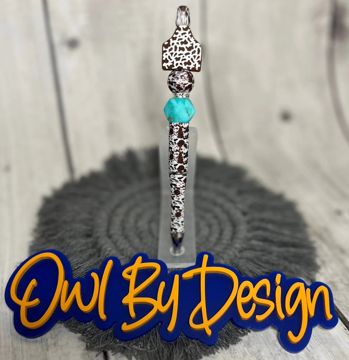 Brown and White Cattle Tag Pen