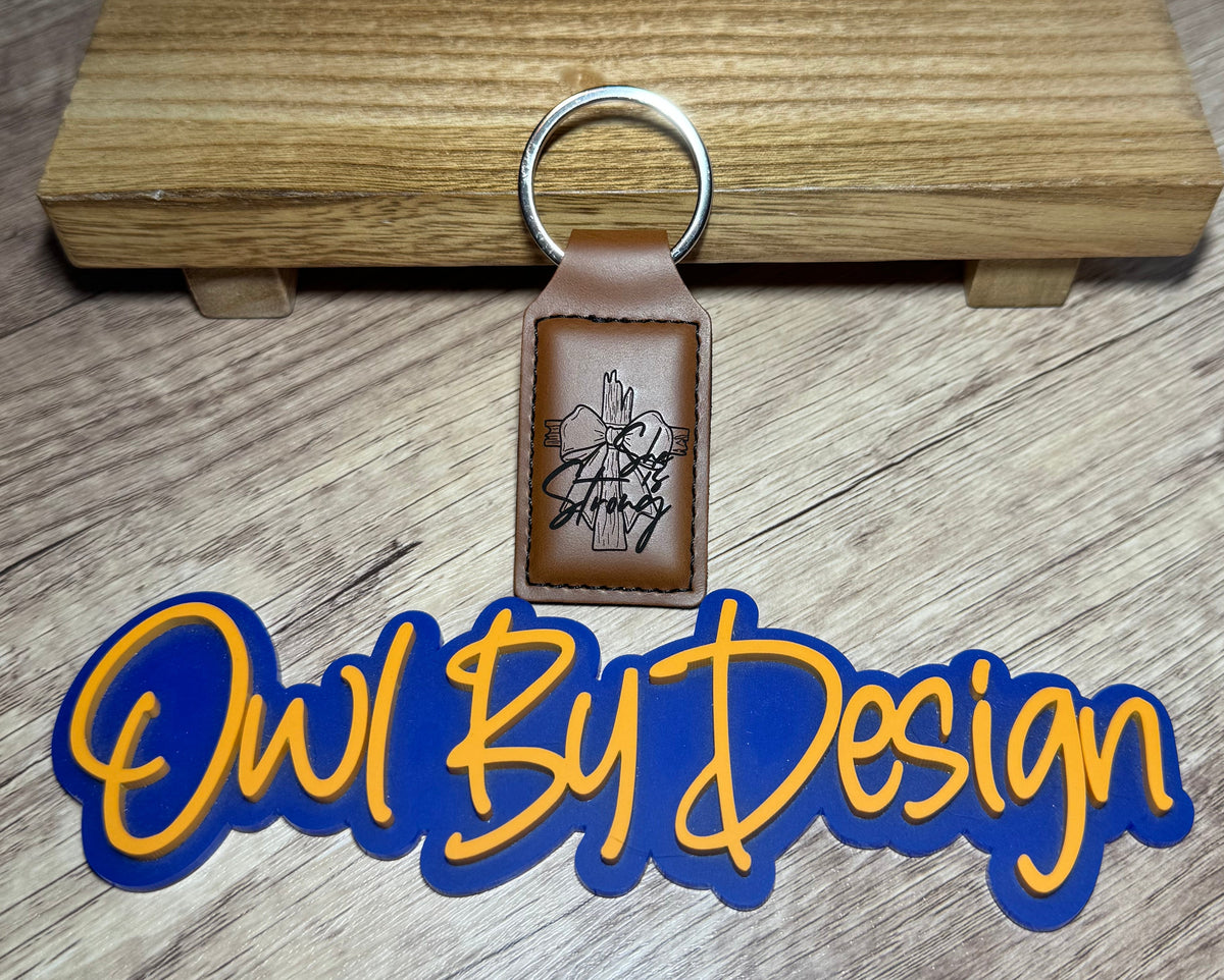 She is Strong Small Leather Keychain